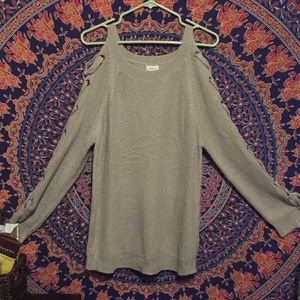 Tan woman’s sweater